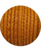 Cordon de cuir rond tressé de 5mm jaune moutarde en vente au cm