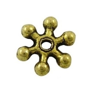 Perle asterisque en metal couleur or antique