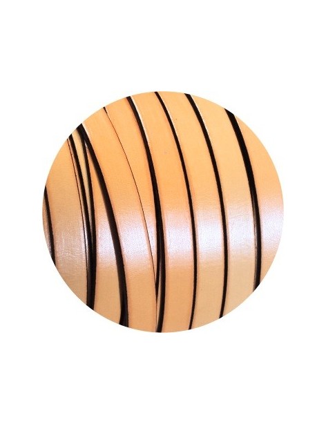 Cordon de cuir plat 10mm x 2mm de couleur orange clair vendu au cm