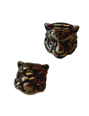 Une perle tête de tigre couleur bronze avec un trou de 1.5mm